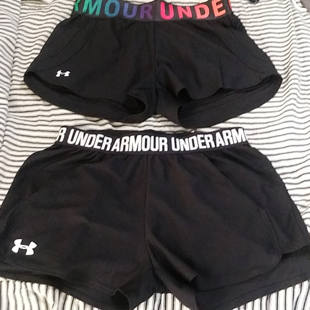 2 pair of under armour running shorts
